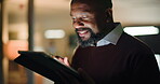 Night, happy and black man in office with tablet, reading email and review of business report. Dark, smile and person in workplace overtime with digital technology, research and feedback for project.