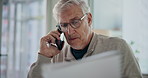 Mature businessman, phone call and documents at office, contact and investment advice at agency. Person, financial advisor and smartphone with paperwork, networking or consulting at finance company