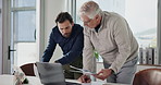 Business, laptop and men in office, teamwork and conversation with copywriting. People, journalist and employees with pc, help and feedback for newsletter, company website layout or online magazine