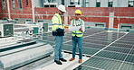 Men, engineer and talk with blueprint for solar panel design, floor plan and technical drawing. People, document and explain layout for grid installation, photovoltaic repair and team for maintenance