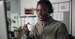 Telemarketing, man and employee with coffee in call center, talking and explaining service with mic. Computer, consultation and black person with headset for communication, drink and hot beverage