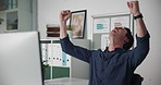 Man, fist pump and happy with computer at office for success, achievement or good news at finance agency. Person, accountant and shout for celebration, promotion and goals with bonus at company