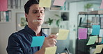 Sticky note, thinking and business man in office for task agenda, project ideas and schedule. Startup, creative agency and person writing on glass for brainstorming, research and planning strategy