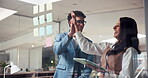 High five, storyboard and tablet with business people in office together for brainstorming success. App, collaboration and planning with employee team at work on glass wall in workplace for goals