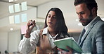 Business, teamwork and writing on glass wall with tablet, marketing or planning ideas in office. Project management, man and woman with sticky note, digital app or collaboration for research strategy