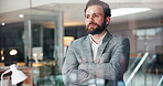Thinking, crossed arms and man in office at night, reflection or daydream in company success. Corporate, vision and entrepreneur in workplace with window, plan and foresight in KPI achievement.