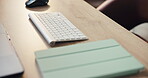 Keyboard, mouse and tablet on desk in office for after hours or break from small business startup. Laptop, still life and technology on wooden table in empty home office for freelance or remote work
