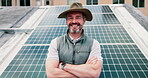 Face, man and technician with arms crossed for solar panel installation, about us and maintenance. Portrait, mature electrician and happy with career pride, photovoltaic repairs and renewable energy