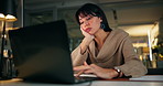 Business woman, laptop and bored in night office for editing, deadline and journalist website glitch. Fatigue, technology and tired girl with overtime strain, creative block and frustrated for report