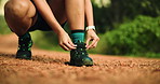 Nature, fitness and woman tie shoes ready to start workout, exercise and training for hike outdoor. Sports, sneakers and hands of person with shoelace for wellness, health and adventure on trail