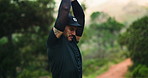 Man, trail runner and stretching for warm up in forest, exercise and ready for marathon training. Person, athlete and fitness routine with preparation for workout, outdoor and nature in Argentina