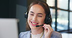 Call center, talking and woman in office on computer for online help, consulting and contact us. Professional, business and worker with headset for customer support, crm service and communication