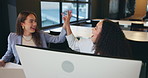 Happy women, business and high five with computer in office for company success, promotion or bonus. Excited, female people or employees with smile for good news, deal or done deadline in workplace