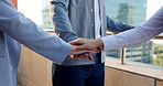 Business people, hands together and meeting with applause on balcony for teamwork or unity in city. Group, employees or colleagues with pile or stack in huddle for collaboration or mission in town