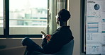Phone, thinking and window with business black man in office for financial feedback or update from back. Planning, view and vision with finance employee in workplace for review of charts or graphs