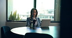 Coffee, laptop and phone with business woman in boardroom of office for report, research or review. App, computer and typing with employee at table in workplace for communication or notification