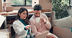 Couple, laptop and planning in new home with boxes, coffee or search for furniture with online shopping. People, computer and moving with real estate, ecommerce or point for interior design at house