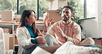 Conversation, pointing and couple in new home with talking, celebration or mortgage approval in property. Chat, people or financial investment in discussion with real estate or upgrade for relocation