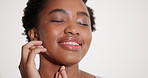 Beauty, face and skincare with black woman in studio for dermatology results or treatment. Aesthetic, cosmetics and facial with happy African model isolated on white background for antiaging benefits