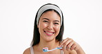 Face, brushing teeth and woman in studio, smile and dental health on white background. Mockup space, wellness and happy person with oral care, whitening and fresh breath with hygiene or remove plaque