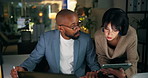 Late, meeting and business people on tech in office for finance review, proposal deadline and planning. Corporate, night and woman with man on tablet for revenue report, financial advice and feedback
