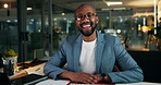 Face, night and smile of business black man at desk in office for deadline satisfaction. Computer, evening and glasses with happy African employee in workplace for dedication, planning or research