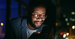 Bokeh, black man and glasses at screen with phone, chatting and texting on dating app. Happy, African person and smile in conversation with mobile, night discussion and excitement for love life.