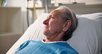 Elderly woman, patient and thinking on hospital bed for recovery, post surgery and reflection. Thoughts, senior person and rest with vision of healthcare service, treatment and healing from operation