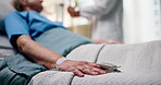 Hand, doctor or old woman with oximeter in hospital bed for blood levels, monitor pulse or recovery. Healthcare, senior patient and medical tool in clinic to track health condition and critical care