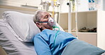 Sick, senior patient and oxygen mask in hospital bed for respiratory support, ventilation or coma. Healthcare, elderly woman or sleeping with respirator in intensive care for surgery recovery or rest
