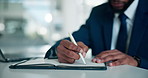 Hands, laptop and businessman writing in notebook for case study notes, contract review or policy. Professional, lawyer or technology with information at law firm for legal research or court schedule