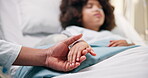 Healthcare, support and child in hospital with parent, unwell and insurance in bed for healing. Comfort, medical or patient with holding hands in clinic with recovery, hope and treatment for disease