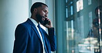 Communication, business or man with phone call by window, negotiation or contract for company acquisition. Discussion, planning or African manager with mobile for deal, consulting or settlement cost