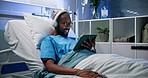 Headphones, clinic and patient with tablet in bed for recovery, comedy movie or online series. Laughing, black man and tech in hospital for watching funny film, listening to audio podcast and healing