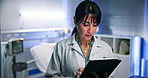 Doctor, checkup and tablet for results in hospital with patient for healthcare or consultation. Research, support and service with tech for diagnosis, medical treatment and thinking in night clinic