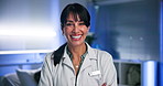 Face, happy woman and doctor in hospital with
confidence, patient care and medical expert at night. Smile, arms crossed and mature healthcare professional with trust, pride and health insurance.