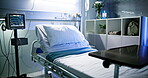 Empty, healthcare interior and hospital bed in room for wellness, recovery and healing at night. Intensive care unit, medical equipment or monitor screen for ECG, rehabilitation or admission facility