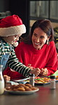 Christmas, mother and child piping cookies in kitchen for bonding together, decoration and creativity. Festive holiday, mom and kid with biscuit, sweet treat icing and snack preparation in home.