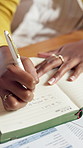 Woman, hands and writing with diary for schedule planning, agenda or tasks with to do list on desk. Closeup, female person or planner with notebook or pen for notes, reminder or track productivity