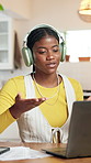 Black woman, video call and advice with headphones in home for customer service, support or help. Female person, laptop and remote work for telecommunications, virtual assistance or meeting in house
