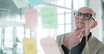 Mature, businessman and thinking with schedule planning for tasks, agenda or reminder in office. Thoughtful, man or employee with glasses or reflection for brainstorming, ideas or project management