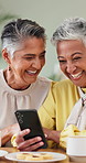 Happy, senior people and laughing with phone for reunion, social media and reading funny meme. Happy, elderly friends and mobile for comedy video, browsing website and message notification at house