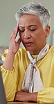 Mature, business woman and headache with laptop, deadline pressure and massage temple with burnout. Professional, person and migraine tension with brain fog, vertigo or mental strain by pc for typing