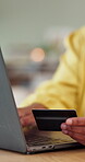 Hands, person and laptop with credit card for online shopping, typing password or checkout discount code. Internet banking, shopper and easy payment with fintech, ecommerce and account info at home