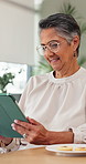 Senior, happy woman and reading with tablet for online book, story or news in retirement home. Elderly, female person or pensioner with smile or glasses on technology for ebook or digital novel