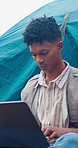 Camping, laptop and sustainability with man outdoor in nature to research ecosystem development. Computer, conservation and typing with serious African person in tent for environmental protection
