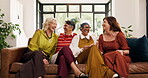 Happy, friends and old women on couch, home and bonding on break, conversation and reunion in lounge. Senior people, laugh and discussion in living room, chill and together on weekend in apartment