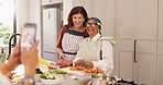 Cooking, photograph and senior friends in kitchen of home together for bonding or culinary class. Food, memories and picture with old women in apartment for how to lesson, learning or meal prep