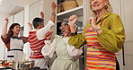 Mature, happy women and dancing with friends in kitchen for cooking or social gathering in home. Female people, group or vibe with smile, energy or music for meal prep, food or get together in house