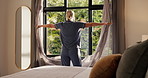 Back, open drapes and woman at window for wake up, morning reflection and weekend getaway at hotel. Thinking, female person and curtain in bedroom with holiday view, calm thoughts and contemplation.